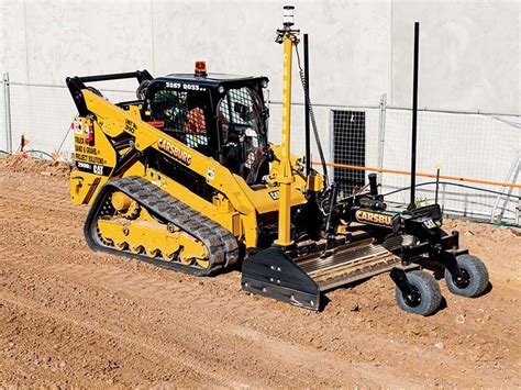 cat bucket track loader grading